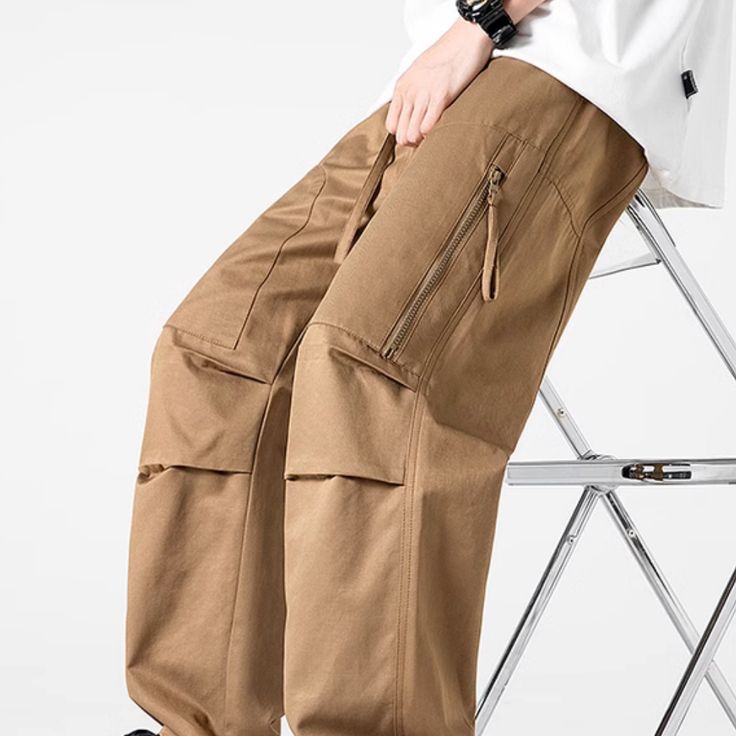 Elevate your style with our Japanese Zipper Pleated Pocket Cargo Pants. With a sleek and unique design, these pants offer both fashion and function. The Japanese zipper adds a touch of luxury, while the pleated pockets provide practicality. Perfect for the fashion-forward individual who appreciates the finer details. Features: -85% Cotton,15% Polyester -Mid-rise waist -Multi-Pockets -Regular Fit -Japanese style Pocket Cargo Pants, Japanese Style, Elevate Your Style, Cargo Pants, Your Style, Mid Rise, Fashion Forward, Unique Design, Unique Designs