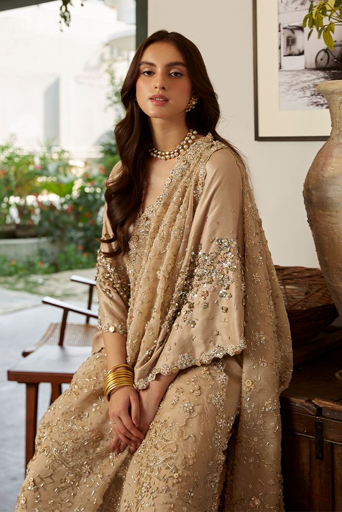 Golden Embellished Pakistani Wedding Dress in Raw Silk is a stylish masterpiece adorned with Hand-crafted details of Sequins, Beads, Sitara, and Motifs. Glamorous Hand Embellished Georgette Dupatta, Semi-stitched Raw Silk Dupatta With Sequins, Glamorous Wedding Traditional Wear With Resham Embroidery, Elegant Sequined Traditional Wear For Weddings, Elegant Sequined Traditional Wedding Wear, Glamorous Embellished Wedding Traditional Wear, Glamorous Semi-stitched Hand Embellished Dupatta, Glamorous Georgette Dupatta For Wedding, Sequin Organza Saree For Wedding