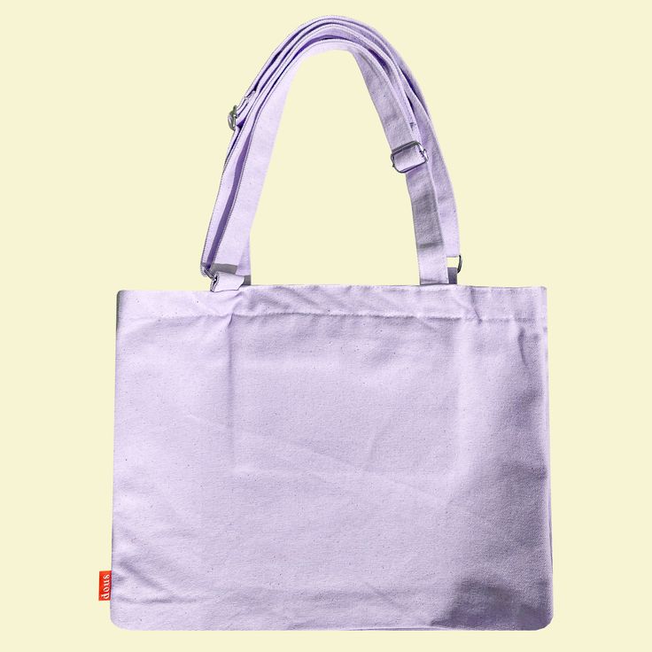 Product Description Made with 100% light purple color cotton shell and color blocked with grey details Length 41 cm x Height 31 cm x Width 9 cm Width 12 cm Heavy duty 12oz canvas Inner pocket with zipper (20 x 13 cm) Handle 70 cm (adjustable) Padded laptop pocket Canvas Bag With Adjustable Strap In Solid Color, Solid Canvas Bag With Zipper Pocket, Solid Color Canvas Bag With Zipper Pocket, School Shoulder Bag With Zipper Pocket In Purple, Purple Shoulder Bag For School With Zipper Pocket, Purple Shoulder Bag With Zipper Pocket For School, Purple Canvas Travel Bag, Purple Large Capacity Canvas Bag For Everyday, Large Capacity Purple Canvas Bag For Everyday Use