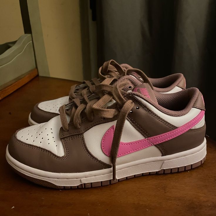 Nike Women’s Dunks In The Color Smokey Mauve! Almost Brand New! Only Worn Once! Size 7 Women’s, Brown And Pink! There Is A Crease On The Right Shoe But That Can Easily Be Fixed! Any Question, Comments Or Concerns Feel Free To Ask Shoes Nike Women, Shoes Nike, Pink Brown, Womens Shoes Sneakers, Nike Shoes, Nike Women, Shoes Sneakers, Size 7, Feel Free