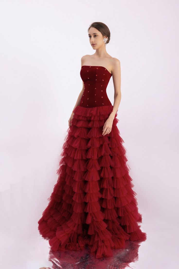 The ruffle layer and mesh silk create a dramatic and elegant silhouette, while the floor length design exudes sophistication. Perfect for any formal occasion, this dress will make you feel like the belle of the ball. *Note: - The length is measured from the shoulder to the hem.- Product color is varied due to studio lighting. Silk Floor Length Dress, Red Rose Dress, Lace Ruffle Dress, Mean Blvd, Floor Length Dress, Red Gowns, Studio Lighting, Lace Ruffle, Floor Length Dresses