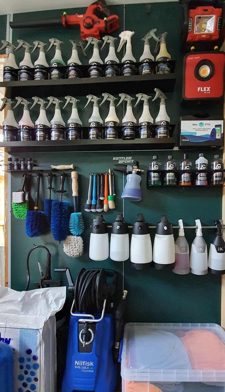 there are many different items on the shelves in this room, including hairdryers and blow dryers