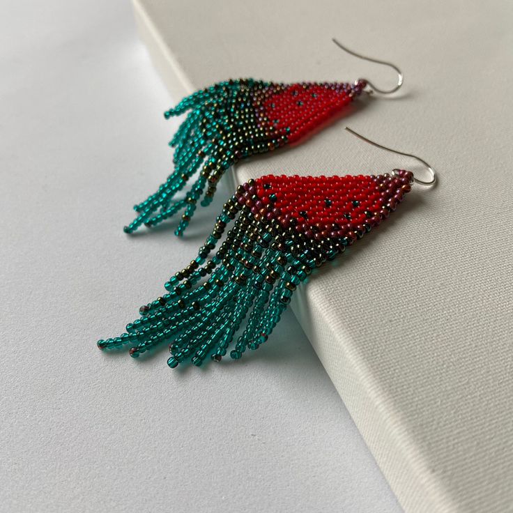 "These boho chic red-turquoise beaded earrings are made of high quality Czech beads. Colors: red, burgundy, dark green, turquoise. -------------------------------------------- ✦ The Details: ✔ Made with quality Czech beads ✔ Made using strong bead weaving thread. ✔ Lenght: app. 3.9 inches ✔ Sterling silver earrings hooks There may be some color discrepancies which is due to the different monitor settings ✦ All earrings hooks are nickel and lead free! ✦ More great boho earrings found here https:/ Turquoise Bead Earrings, Beads Colors, Native American Beaded Earrings, Boho Chic Style, Native American Beading, Earrings Bohemian, Red Turquoise, Western Jewelry, Red Burgundy