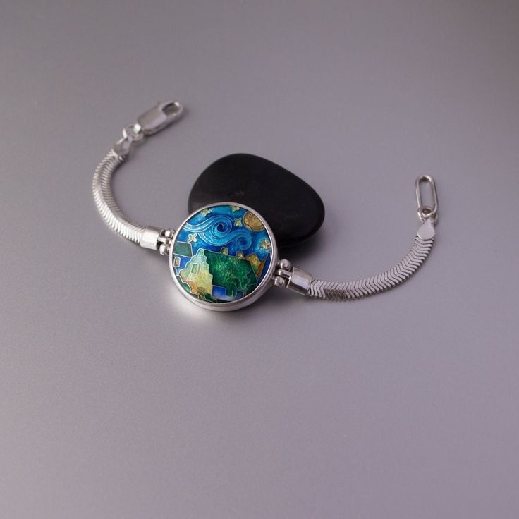 Circle Enamel Bracelet Cloisonne enamel Sterling silver Double-sided enamel bracelet Bracelet on silver chain Handmade enamel bracelet by CloisonneMinanqari on Etsy Enamel Bracelet Jewelry Gift, Unique Enamel Bracelets As Gift, Sterling Silver Cabochon Bracelet As A Gift, Silver Enamel Jewelry With Polished Finish, Hand Painted Enamel Bracelets As Gift, Hand Painted Enamel Bracelets For Gifts, Blue Wearable Art Bracelet, Nickel-free Enamel Bracelet As A Gift, Artistic Silver Metal Bracelets