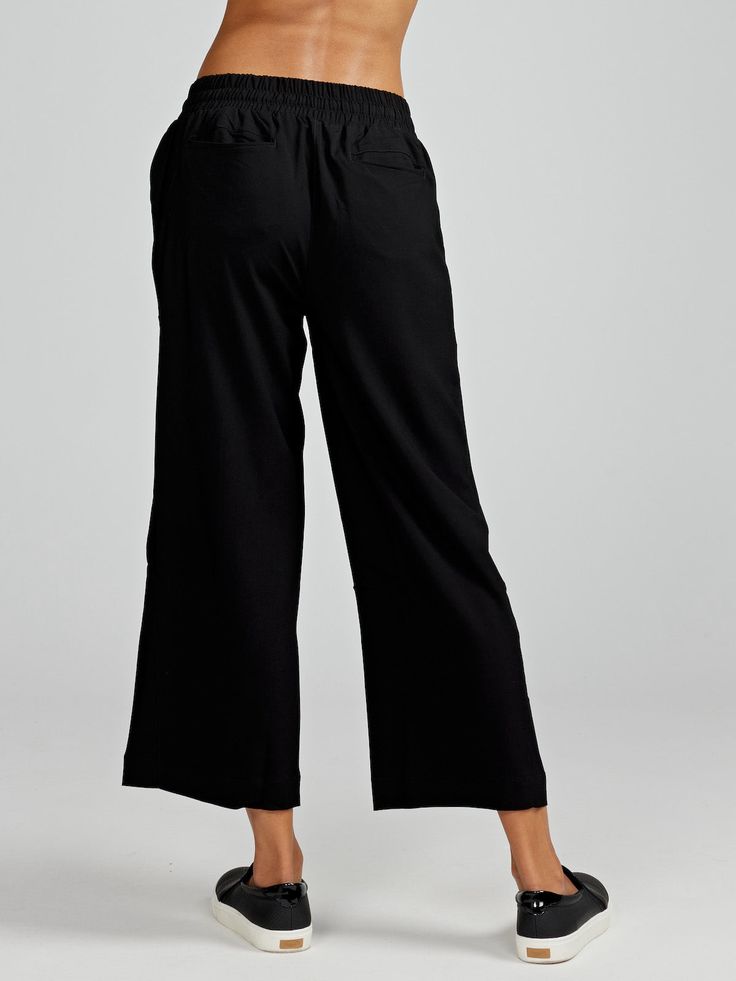 The Weekend Wide Leg Pant is your go-to choice for laid-back days. Crafted from lightweight fabric, it offers optimal comfort and freedom of movement. Its wide leg design ensures a relaxed fit, making it perfect for casual outings and leisurely strolls. With its versatility and effortless style, it's an essential addition to your wardrobe. It's also available with a longer 25" inseam. Relaxed Fit Athleisure Pants With Straight Hem, Relaxed Fit Straight Hem Athleisure Pants, Athleisure Pants With Relaxed Fit And Straight Hem, Versatile Wide Leg Pull-on Pants For Loungewear, Relaxed Fit Wide Leg Pants With Pull-on Style, Everyday Athleisure Bottoms With Straight Hem, Comfortable Relaxed Fit Straight Leg Activewear, Casual Comfort Stretch Straight Sweatpants, Casual Comfort Stretch Sweatpants