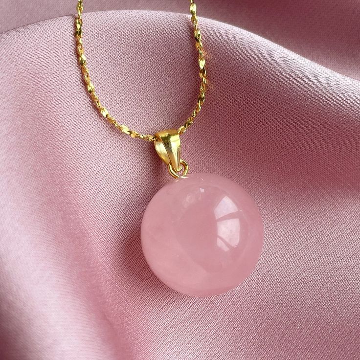 Delicate Rose Quartz pendant showcasing a natural sphere-shaped gemstone and 18k gold filled over sterling silver chain 45cm. Our Rose Quartz jewelry reflects timeless concepts of spirituality, sentiment, and personal expression. Various chains available in variations from Stainless Steel to Sterling Silver + Rhodium plating. ♡ Few reasons to choose Rose Quartz jewelry: ꕥ The crystal par excellence for any matters relating to the emotions. ꕥ This gemstone is fantastic for the moments when need o Rose Quartz Jewelry, Pendant Necklace Gold, Star Chain, Rose Quartz Pendant, Quartz Jewelry, Quartz Sphere, Ball Pendant, Quartz Rose, Beautiful Gifts