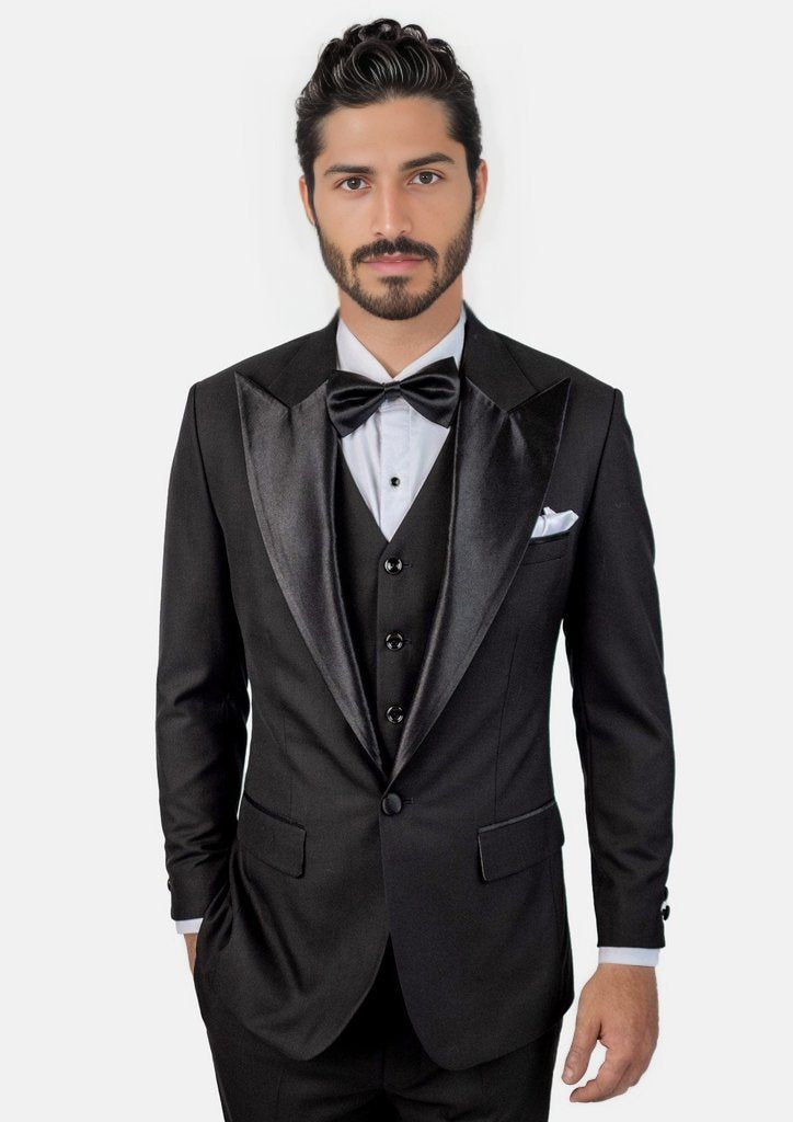 Crafted from a luxurious sharkskin weave wool, the Liberty Black Tuxedo is a sophisticated, statement-making formalwear option. Wide peak lapels in a single button configuration stand out from typical tuxedo styles. Dress to impress with this high-end, premium garment – a modern blend of elegance and refinement. Elegant Single Breasted Blazer For Black-tie Events, Elegant Single-breasted Blazer For Black-tie Events, Tuxedo Suits For Black-tie Gala Events, Notch Lapel Tuxedo For Black-tie Gala Events, Single Breasted Tuxedo For Wedding, Wedding Tuxedo Single Breasted, Single-breasted Tuxedo For Wedding, Black Formal Blazer For Gala, Elegant Wedding Tuxedo In Suiting Fabric