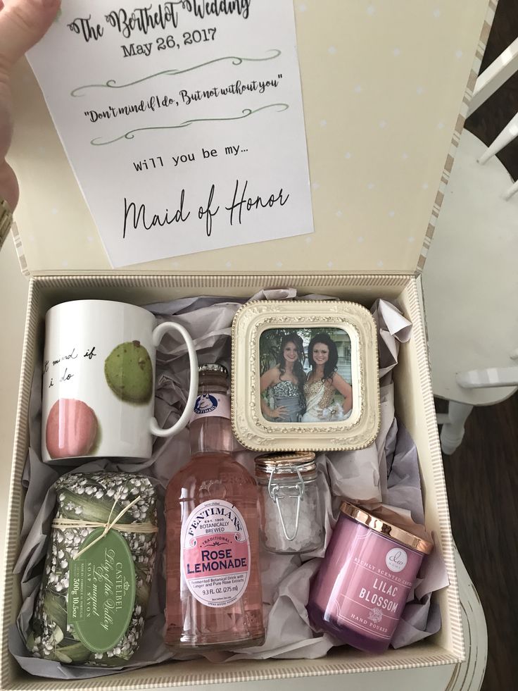 an open box with personal items inside and a note on the lid that says, happy mother's day