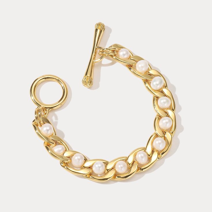 A perfect present for any special event, our Pearl Twist Bracelet is crafted with genuine brass and beautiful pearls. An elegant and stylish accessory, this luxe bracelet is sure to add a touch of sophisticated grace to any occasion. A truly unique and timeless piece, make this the gift of choice for an unforgettable celebration. DETAILS Plating: 18k Gold Materials:   18K Gold on Brass, Freshwater Pearl Measurements: Length: 6.30"(16.0cm) Weight:  36.3g Elegant Round Chain Bracelet With Toggle Clasp, Elegant Chain Bracelet With Toggle Clasp For Formal Occasions, Elegant Formal Chain Bracelet With Toggle Clasp, Elegant Metal Bracelet With Lobster Clasp, Elegant Metal Bracelets With Lobster Clasp, Pearl Chain Metal Bracelet Gift, Elegant Gold Metal Bracelet With Toggle Clasp, Elegant Bangle Bracelet With Clasp, Elegant Gold Bracelet With Toggle Clasp