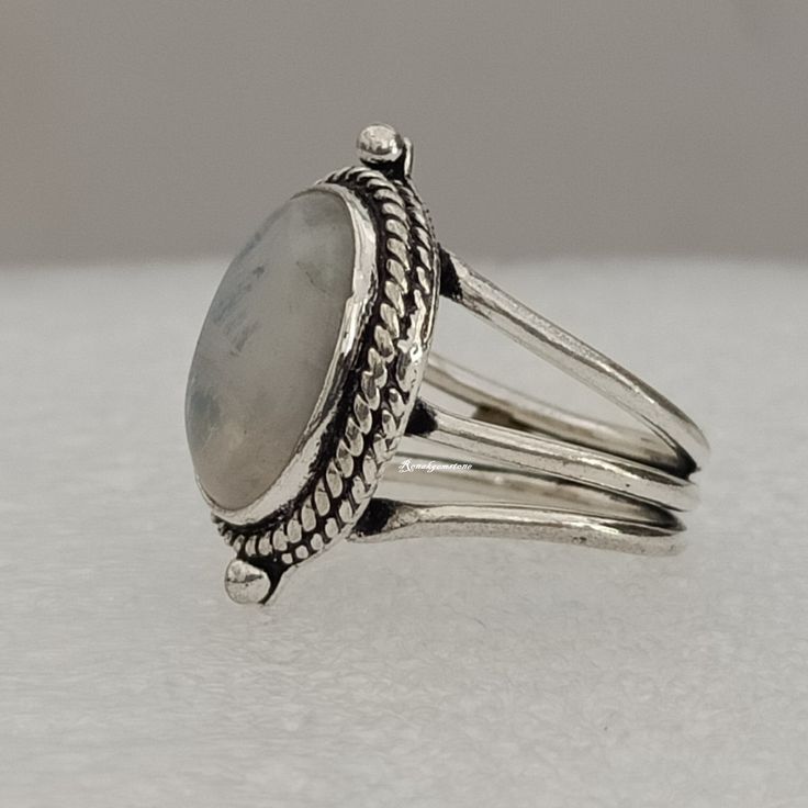 Genuine Moonstone Ring, Moonstone Silver Ring,Rainbow Moon stone Ring, Handmade Moonstone Ring, Moonstone Ring, Boho Ring, Moon Stone Ring, Handmade item Materials: Silver Gemstone: Moonstone Raw stone Gem colour: White Band colour: Silver Style: Boho & hippie Made of 925 Sterling Silver and Rainbow Moonstone (Genuine) Comes in a FREE GIFT BOX Perfect Mother's Day Gift For Mom Makes a Wonderful Gift for your Girlfriend, Wife, Mom or Simply an Excellent Addition to Your Jewelry Collection. USA Seller: Same Day Shipping From USA World Wide Shipping Available ❥ Metal: 925 sterling silver ❥ Gemstone: Moonstone ❥ Gemstone Color: Rainbow Moonstone ✈ Free Shipping in the USA (USPS) 🎁 Free Gift Box ↻ 30 Days Return or Exchange ⌛ 24 hours Handling Time ☎ Feel free to contact me with any questions Moon Stone Ring, Ring Moon, Ring Moonstone, White Band, Silver Style, Ring Boho, Gifts For Your Girlfriend, Monogram Fonts, Boho Ring