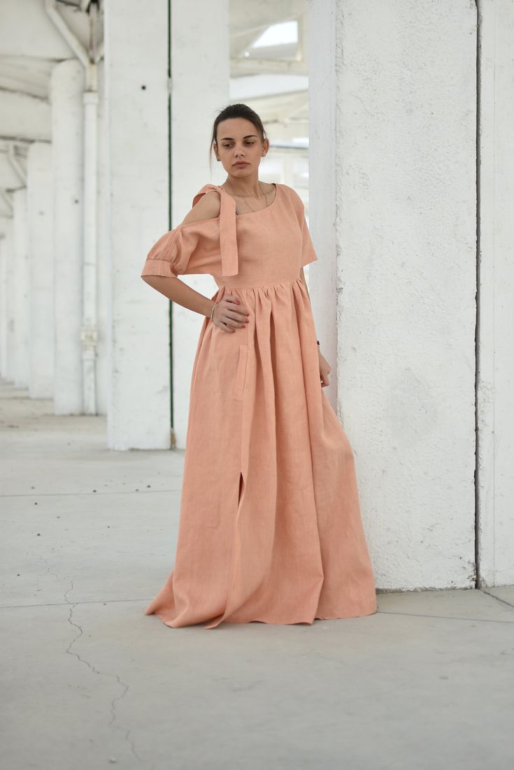 "Peach Linen Dress, Boho Linen Dress, Linen Kaftan Dress ◈ Stylish and chic fashion is our shared dream! You can be sure that this piece is made with a lot of love and craftsmanship. ◈ S I Z I N G ◈ The model wears size S and the length of the item is approximately 135 cm. This item is available from XS to 4XL. Please, have a look at my Size Chart below before placing your order. ◈ D E L I V E R Y ◈ This item will be shipped in up to 5 days after your order was placed. We use Express worldwide s Orange Maxi Length Dress For Wedding, Orange Maxi Dress For Wedding, Orange Maxi Length Wedding Dress, Summer Wedding Peach Dress, Peach Summer Wedding Dress, Peach Maxi Length Bridesmaid Dress, Peach Maxi Dress For Bridesmaids, Peach Maxi Bridesmaid Dress, Peach Fitted Maxi Dress For Wedding