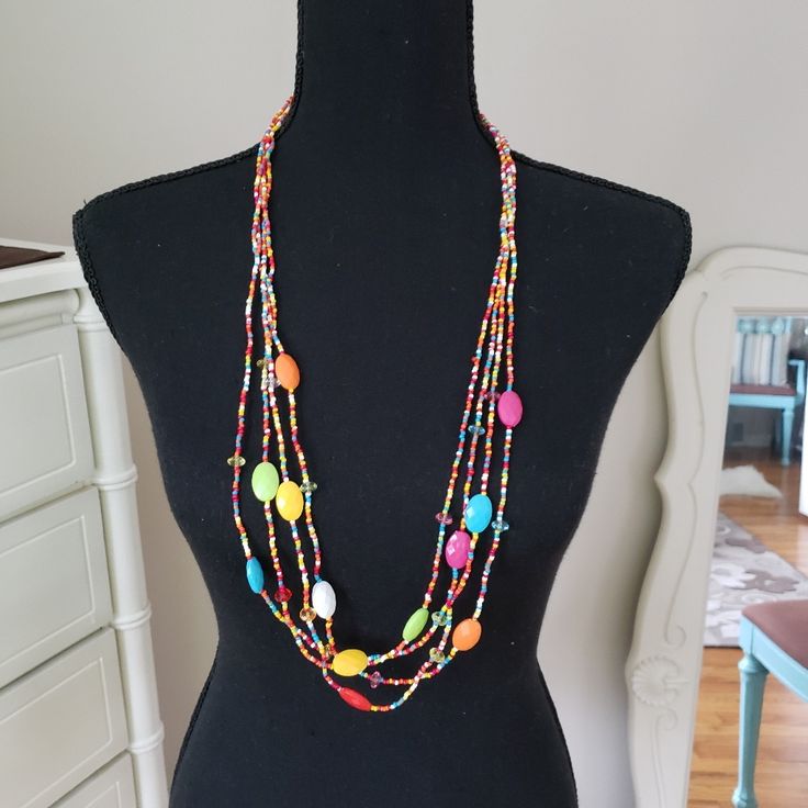 Very Pretty And Colorful Long Necklace With Seed Beads And Accent Beads That Catch The Light. 35" Long With 2" Extender. Wear It Long Or Double It Up To Wear It Shorter! Excellent Condition, Never Worn. Faceted Beads Long Necklace For Beach, Long Faceted Beads Necklace For Beach, Long Necklace With Faceted Beads For Beach, Beach Long Necklace With Faceted Beads, Beach Beaded Necklace With Large Oval Beads, Adjustable Multicolor Long Necklace With Colorful Beads, Adjustable Long Necklace With Colorful Beads, Multicolor Multi-strand Necklace For Beach, Multicolor Long Necklace With Round Colorful Beads