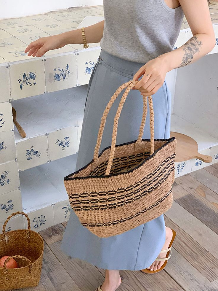 IN STOCK FAST SHIPPING FROM LOS ANGELES Get ready to tote your summer essentials in style with this handmade straw bag! Made from natural raffia, this bag features a charming daisy flower design and a large opening for easy access. The top handles make it a breeze to carry, perfect for a day at the beach or a picnic in the park. It's the ultimate combination of fashion and functionality. (Plus, it's totally handmade, so you know it's special.) Size: 8"H x 15"W x 5"D Designer Style ID: 8705 Daisy Flower Design, Straw Handbags, Picnic In The Park, Straw Bags, Raffia Bag, A Picnic, Day At The Beach, Denim Bag, Designer Style