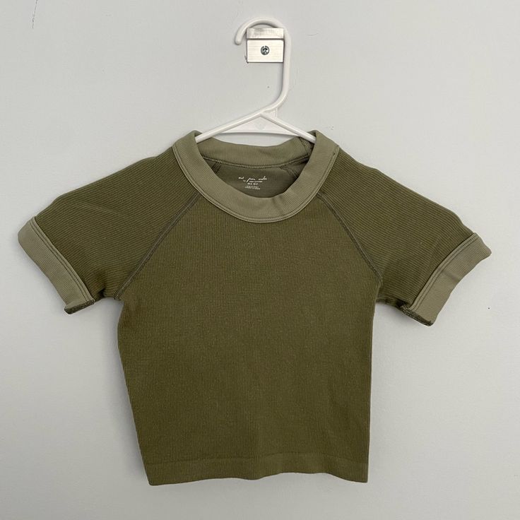 Tight T-Shirt Size Xs/S. Never Worn. Very Soft. 55% Polyamide 39% Modal 6% Elastane Green Stretch Y2k T-shirt, Green Stretch Cotton Cropped T-shirt, Green Fitted Cropped T-shirt With Crew Neck, Urban Outfitters Stretch T-shirt With Short Sleeves, Snug Fit Crew Neck Top In Athleisure Style, Green Fitted Crew Neck Top, Athleisure Snug Fit Crew Neck Top, Snug Fit Crew Neck Top For Athleisure, Fitted Green Crew Neck Top