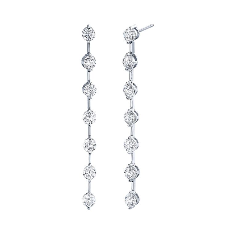 Finely crafted from 18K Gold with glittering, hand-selected diamonds along a sleek, elegant line drop silhouette, these diamond earrings are the perfect statement piece for any look. Enhance your collection with 3.36ct of pure luxury. Modern Diamond Drop Earrings With Single Cut Diamonds, Elegant Linear Diamond Cut Earrings For Formal Occasions, Elegant White Gold Diamond Earrings With Single Cut, Elegant Diamond Cut Linear Earrings For Formal Occasions, Dazzling Single Cut Diamond Drop Earrings, Elegant Diamond-cut Linear Earrings For Formal Events, Formal Long Drop Diamond Linear Earrings, Elegant Long Drop Diamond Cut Earrings, Elegant Diamond White Linear Earrings