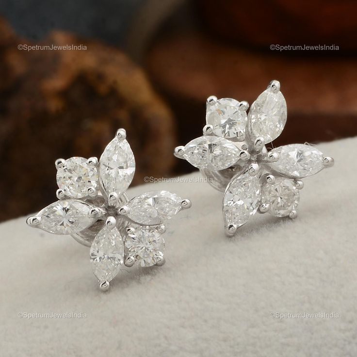 "A perfect blend of classy and elegant design Earrings featuring 18k White Gold with Diamond. This is must to provide you an eye-catching attention. ✧✧Welcome To Our Shop Spectrum Jewels India✧✧ \"\"18k White Gold Wedding Earrings Jewelry, Diamond Earrings, Natural Brilliant Cut Diamond Stud Earrings For Anniversary Gift\"\" ★PRODUCT SPECIFICATION★ * ITEM CODE - SEE-1847A * EARRING LENGTH - 10 Millimetres Approx * EARRING WIDTH - 10 Millimetres Approx * METAL - 18k White Gold * 18k White Gold We Elegant Marquise Diamond Cut Cluster Earrings, Formal Marquise Cluster Earrings With Brilliant Cut, Luxury Bridal Earrings In Flower Shape For Formal Events, Gia Certified White Cluster Earrings For Formal Events, Luxury Floral Shaped Bridal Earrings For Formal Occasions, Luxury Floral Bridal Earrings For Formal Occasions, Fine Jewelry Pear-shaped Cluster Earrings For Wedding, Elegant Diamond Cluster Earrings Gia Certified, Elegant Gia Certified Diamond Cluster Earrings