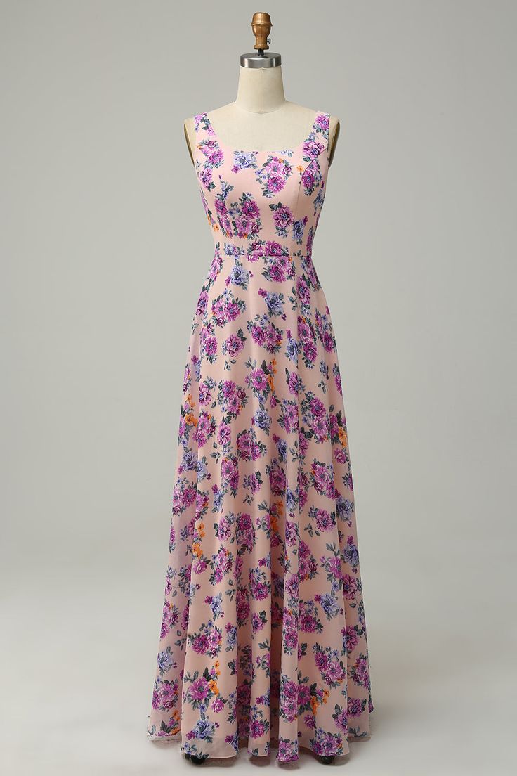 a pink dress with purple flowers on it