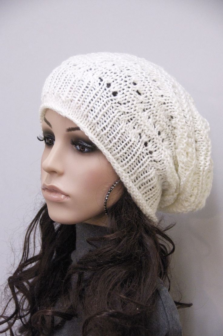 "100% Wool hand knitted hat. This ivory hat features on an interesting shape with irregular patterns and rolled edges. It suits ant outfits style. Color:Ivory Length:11 1/2\" from top to bottom Measurements: 18\" (relaxed) 26\" (stretched) - it can fit any size! Hand wash in cold water with detergent or shampoo and lay flat until dry." Casual White Bonnet One Size, Casual White One-size Bonnet, Warm White Bonnet For Fall, Casual White Knitted Bonnet, White Warm Casual Bonnet, Casual Warm White Bonnet, White Warm Bonnet One Size, Warm White Bonnet One Size, White Knitted Beanie One Size