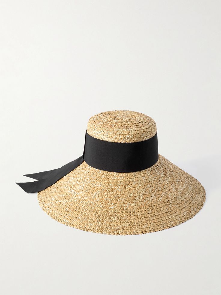 Eugenia Kim's 'Mirabel' sunhat is woven from natural straw and finished by hand in the designer's NYC studio. It's wrapped with black grosgrain ribbon around the crown and has an exaggerated brim that's perfect for shading your face during tropical vacations, and it even contains UPF25+. Elegant Woven Sun Hat In Toquilla Straw, Elegant Woven Straw Hat, Elegant Woven Sun Hat Made Of Toquilla Straw, Chic Handwoven Toquilla Straw Hat, Chic Handwoven Toquilla Straw Sun Hat, Chic Curved Brim Straw Hat, Chic Handwoven Straw Panama Hat, Elegant Handwoven Straw Panama Hat, Elegant Handwoven Toquilla Straw Sun Hat