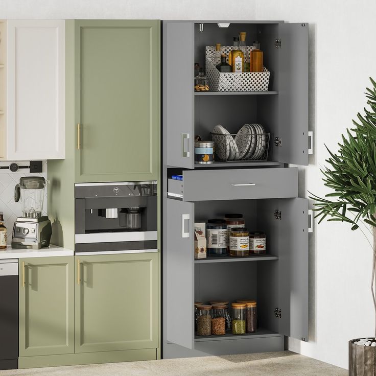 a kitchen with green cabinets and white walls is shown in this image, there are various items on the shelves