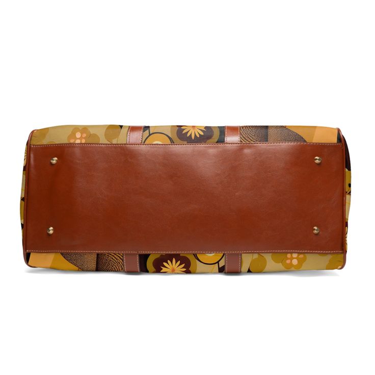 Jet set in retro style with this 60s-70s inspired geometric duffel bag. Featuring bold abstract floral prints in mod colors, this groovy weekender carry-on pops with psychedelic flower power. The durable construction and leather accents make this 20" × 12'' × 9" bag ideal for road trips or overnight getaways. With its vibrant old school vibe, this hip weekend bag turns heads while keeping your essentials organized. Travel back to the age of peace and free love with this funky modular duffel! One Retro Multicolor Bags With Zipper Closure, Retro Large Capacity Travel Bag For Everyday Use, Mid-century Brown Shoulder Bag For Travel, Retro Rectangular Bag With Zipper Closure, Retro Square Shoulder Bag For Travel, Retro Travel Satchel With Zipper Closure, Retro Brown Bags With Zipper Closure, Retro Shoulder Bag With Zipper Closure, Vintage Multicolor Bag With Zipper Closure