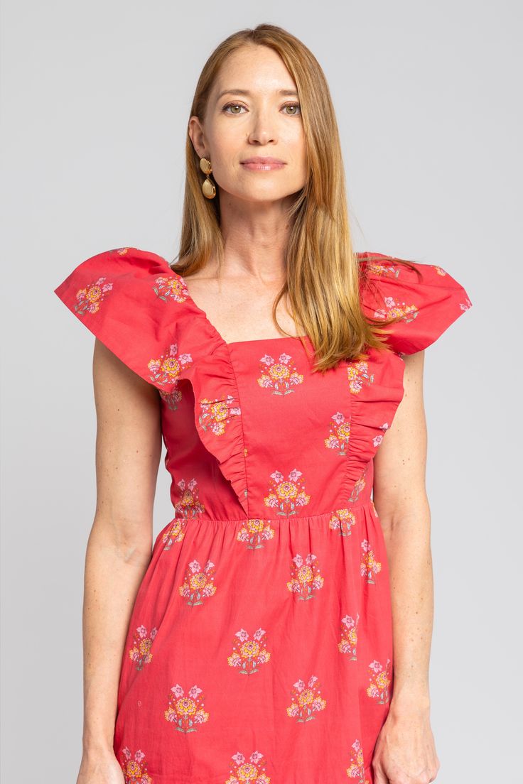 Things we love about the Copeland Dress, a list: Flutter sleeves. A flattering tiered skirt. Pockets! And the bold raspberry red floral with pops of pink and citrus hues. The maxi-length dress stuns on its own, but we love it paired with a cropped jacket—denim and leather both work great. Details Red floral print Pockets Maxi dress 100% cotton fabric Fit Notes Jacklene takes a S in this style Care Instructions Machine wash cold Gentle cycle Do not bleach Lay flat to dry Iron low Shipping Ships i Pocket Maxi Dress, Blue Daisy, Cropped Denim Jacket, Tier Skirt, Dress 100, Red Floral, Xl Dress, Flutter Sleeve, Dresses Xs