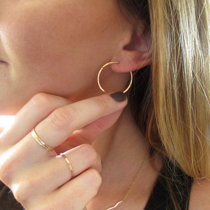 "These delicate hand crafted 14k gold filled, sterling silver, or rose gold filled hoops are hand shaped, filed, forged and polished to a glittering finish. The high quality metal will never turn no matter how much you wear them - just clean them with some windex or warm soapy water and they're good to go! They measure 1\" in diameter, are virtually weightless, and close with a loop in the back. These earrings are in it for the long haul : we only use high quality 14k gold filled and rose gold f Hypoallergenic Small Hoop Earrings In 14k Gold Filled, Minimalist Hoop Jewelry As Gift, Minimalist Hoop Jewelry Gift, Everyday Hoop Jewelry In Recycled Gold, Nickel-free 14k Gold Hoop Jewelry, Everyday Recycled Gold Hoop Jewelry, Gift Tarnish Resistant Recycled Gold Hoop Earrings, Gift Recycled Gold Tarnish Resistant Hoop Earrings, Gift Recycled Gold Tarnish-resistant Hoop Earrings