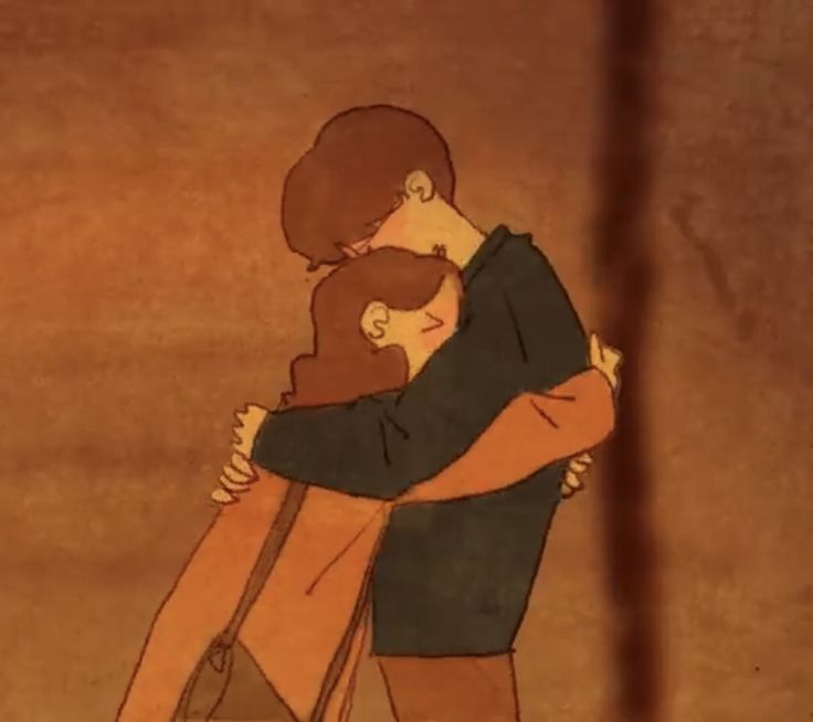 two people hugging each other in front of a brown background