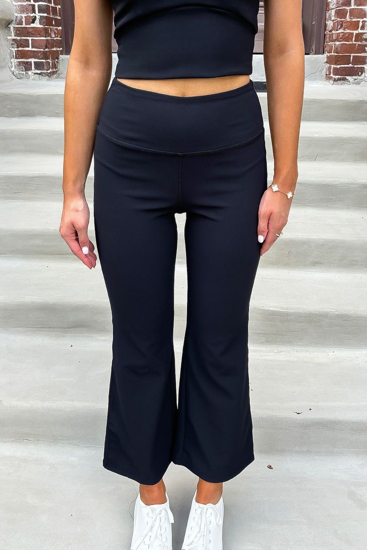 These yoga pants feature a wide yoga waistband, high rise, wide flared hem, ribbed detailing, and a pocket built into waistband on the back. 75% Nylon 25% Spandex Hand wash cold, separately.Do not bleach. Hang dry. Do Not Iron. Madison is 5’8“ wearing a size Small.Model measurements:Bust: 32 in.Waist: 24 in.Hip: 34 In. Soul Mates, Hanging Dryer, Model Measurements, Soulmate, Yoga Pants, Black Pants, Black Color, Bleach, High Rise