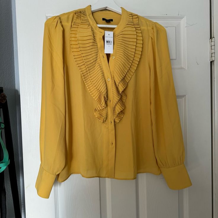 New, Never Worn Ann Taylor Long Sleeve Blouse In Golden Yellow. Lightweight Button Down Purchased For Return To Office But Didn’t End Up Needing. No Flaws. Smoke Free Home. Bundle Items To Save 30% Elegant Yellow Tops For Fall, Yellow Summer Office Shirt, Yellow Long Sleeve Blouse With Ruffles, Chic Yellow Blouse For Fall, Yellow Ruffled Long Sleeve Blouse, Elegant Long Sleeve Yellow Blouse, Yellow Summer Office Tops, Fitted Mustard Top For Work, Yellow Ruffled Long Sleeve Tops