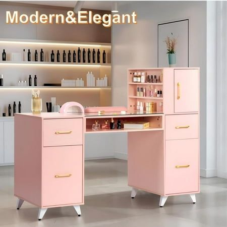 a pink desk with lots of bottles on it and shelves in the background that are filled with personal care items