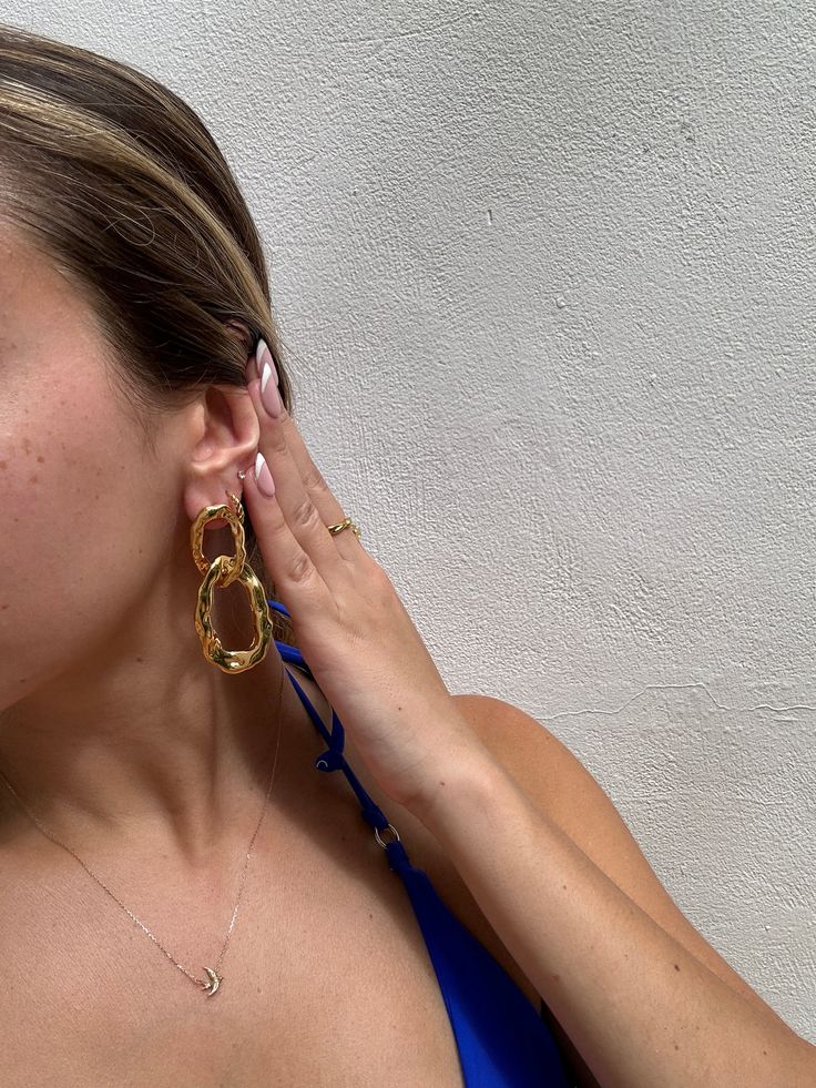 Gold Dangle Earrings - These unique boho make quite the statement! Perfect for dressing up a nice top or on a beach vacation! These interlocking double hoops absolutely stun. 18k gold & stainless steelLength: 11x11cmWeight: about 3oz- water/sweat resistant- gold filled- Style: Minimalist Chic Gold Jewelry For Vacation, Trendy Gold Hoop Earrings For Vacation, Elegant Summer Beach Hoop Earrings, Gold Hoop Earrings For Summer Beach, Chic Gold Earrings For Summer, Summer Beach Gold Hoop Earrings, Trendy Gold Jewelry For Summer, Chic Gold Jewelry For Summer, Metal Earrings For Beach In Summer