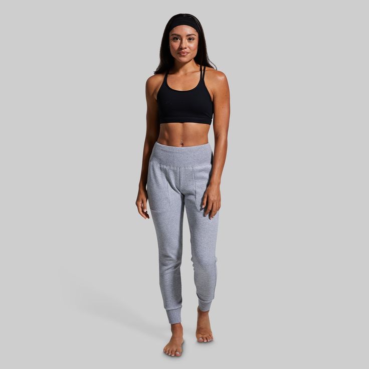 You put in the work on training day, now it’s time to recover with our women's light grey joggers. Made from a stretchy and ultra-soft textured material, slide on our Cloud Joggers for every hard-earned rest day and relax in cloud-like comfort. And don’t worry, if active rest days are more your style, these grey sweats with pockets are the perfect option for light jogs or mobility days. Compression Bra, Put In The Work, Grey Sweats, Rest Day, Rest Days, Training Day, Grey Joggers, Slide On, Training Shoes