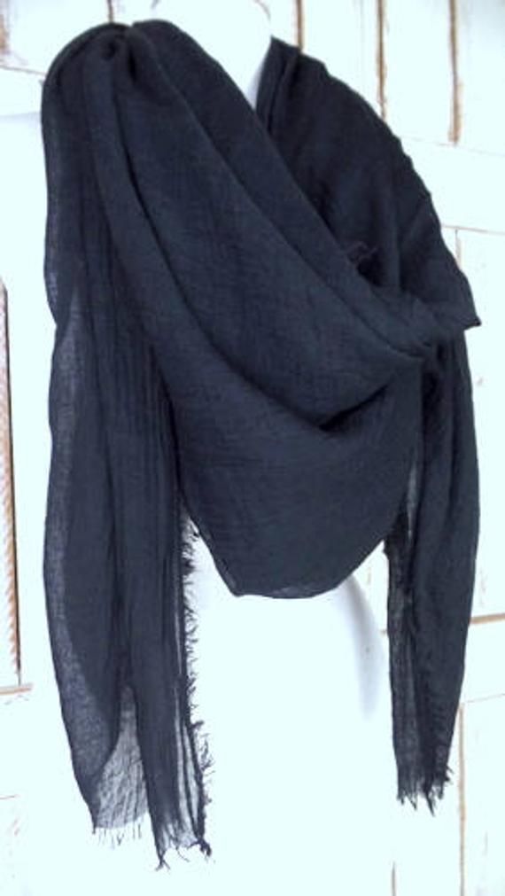 "Handmade large black gauzy crinkled cotton blend wrap shawl scarf/oversized lightweight black scarf/unisex raw hem fringe scarf Measurements... -length: 76\" -width: 56\" Features... -lightweight gauzy cotton/poly blend -raw fringe edges -oversized design perfect for use as a shawl, scarf or cover up -the perfect layering piece -handmade in California -made to order" Oversized Chic Shawl, Chic Oversized Shawl, Oversized Casual Shawl For Spring, Casual Oversized Shawl For Spring, Casual Solid Shawl Scarves, Casual Solid Shawl Scarf, Casual Solid Color Shawl Scarves, Casual Solid Color Shawl Scarf, Black Casual Shawl For Fall