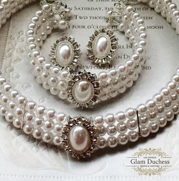 "The details of this luxurious bridal necklace features three strand of creamy pearls and a gorgeous silver or gold plated adornment embellished with dazzling clear crystal with a large oval pearl in the center. This delicate necklace is a perfect accessory for your classic, modern, or vintage-inspired wedding. This necklace is set with a matching bracelet and a stud earrings. * Color : White, Silver, Clear * Theme : Pearl * Necklace Size : 11\" to 14\" adjustable * Decor Size : 1\" L * Bracelet Bridal Choker Necklace, Pearl Jewelry Set, Bridal Jewelry Necklace, White Victorian, Bridesmaids Gift Sets, Evening Jewelry, Bridal Choker, Jewel Wedding, Bridal Jewelry Set