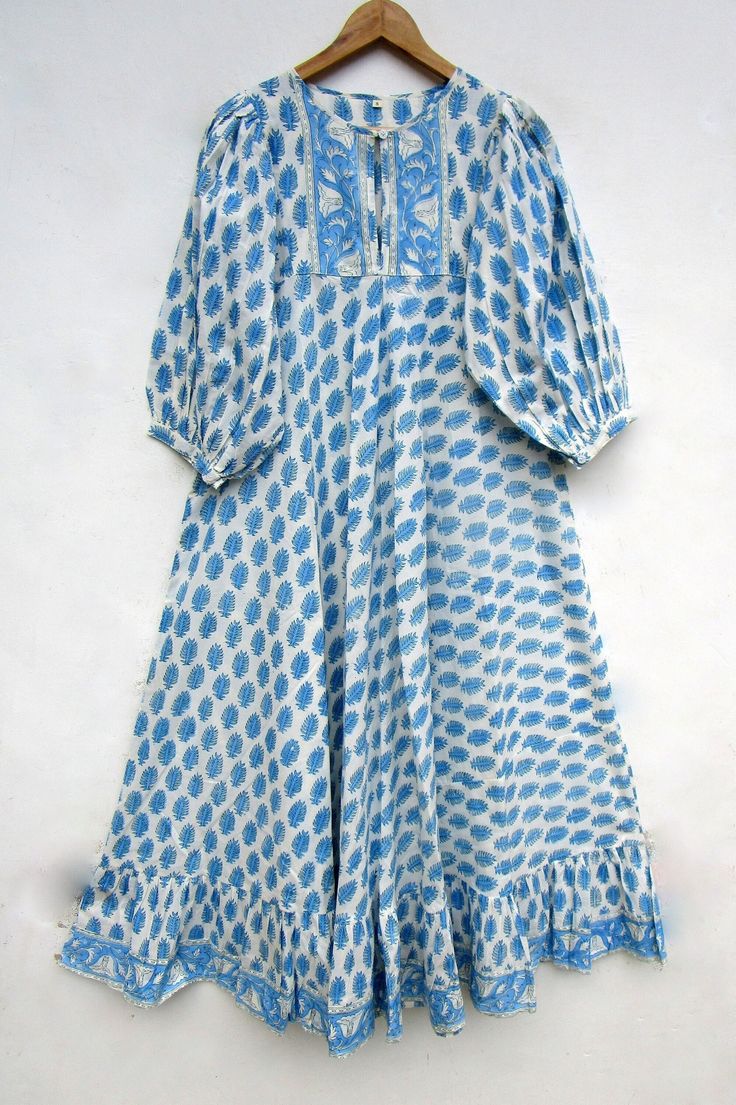 "ITEM DESCRIPTION sky blue flower printed maxi dress - Henley neckline with button maxi dress - 3/4th sleeve with button maxi dress Features: 3/4th sleeve, Henley neck, Long dress Material: Cotton cambric Fabric: 100% cotton soft light weight ethnic print fabrics  Sleeve Length = 18 inch For more sizes & their measurement, please refer our below chart to understand the sizes variations available with us For your size requirement, please mention your size in seller note at the time of buying. SIZE MEASUREMENT  BUSTLENGTHSHOULDER XXS34 inch51 inch13.5 inch XS36 inch51 inch14 inch S38 inch51 inch14.5 inch M40 inch51 inch15 inch L42 inch51 inch16 inch XL44 inch51 inch16.5 inch 2XL46 inch51 inch17 inch 3XL48 inch51 inch18 inch   Company Return Policy:  Please write for more information to my em Blue Midi Dress With 3/4 Sleeves For Summer, Blue Half-sleeve Maxi Dress For Vacation, Blue Half-sleeve Midi Dress For Summer, Blue Half Sleeve Midi Dress For Summer, Blue Midi Dress With 3/4 Sleeve For Beach, Blue Cotton Maxi Dress, Blue Bohemian Half Sleeve Maxi Dress, Blue 3/4 Sleeve Maxi Dress For Beach, Blue Half Sleeve Dresses For Daywear