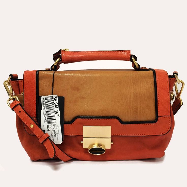 Description: Color: Tangerine Type Of Material: Leather Type Of Trim: Tan Leather Color Of Hardware: Gold Tone Type Of Closure: Top Flap Type Of Handle: Top Handle With 2 “Drop Type Of Strap: Detachable Strap With 18.5” Drop Exterior Details: - Treesje Logo Engraved Pinch Lock Interior Information: - Fully Lined - Single Zip Pocket - Two Slip Pockets Condition: - Light Scuff Marks On Hardware - Slight Areas Of Discoloration On Bags Exterior Evening Cognac Satchel With Detachable Strap, Orange Satchel Shoulder Bag With Gold-tone Hardware, Chic Cognac Satchel For Shopping, Orange Satchel With Gold-tone Hardware For Shopping, Chic Shopping Satchel In Cognac, Cognac Flap Bag For Formal Occasions, Chic Cognac Satchel With Detachable Strap, Chic Orange Formal Satchel, Chic Orange Evening Satchel