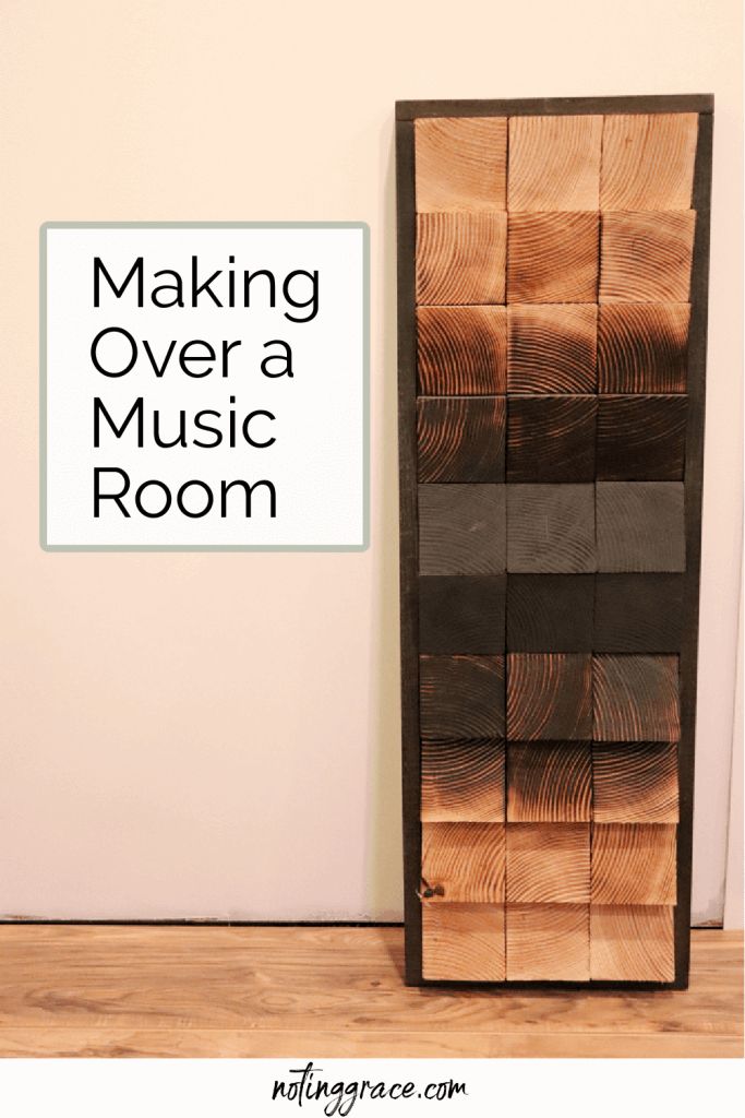 a wooden shelf sitting next to a wall with a sign that says making over a music room