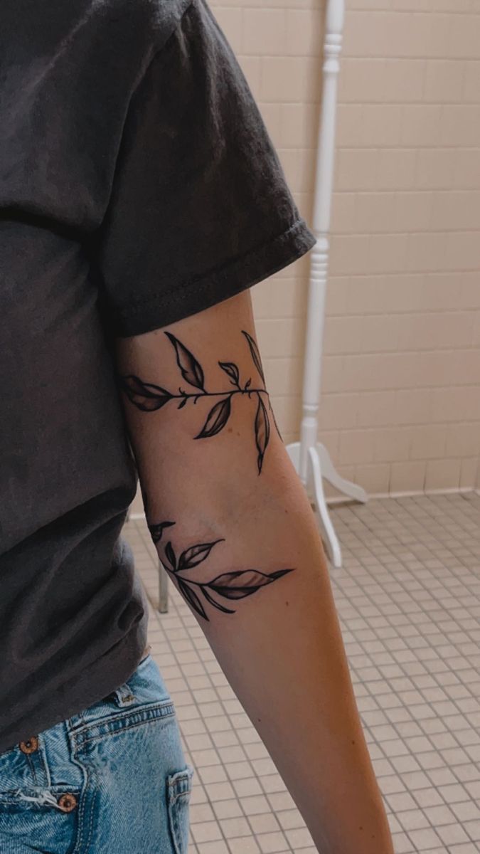 a person with a tattoo on their arm