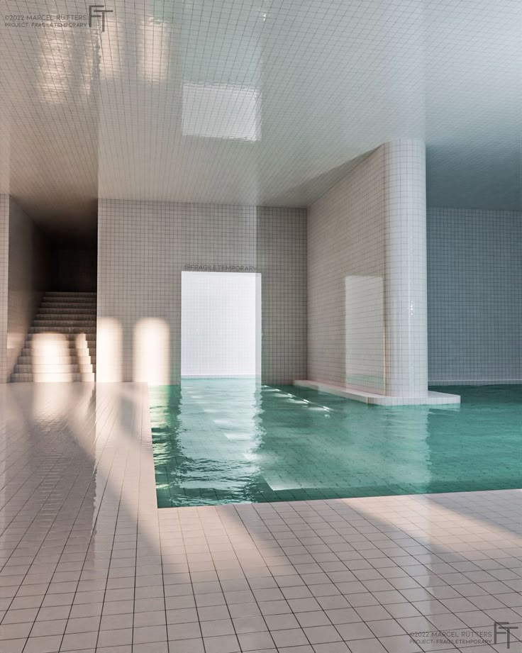 an empty swimming pool with tiled floors and walls, in the middle of a room