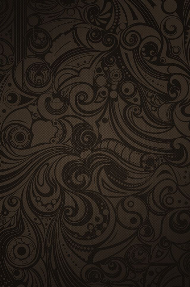 an abstract brown background with swirls and dots