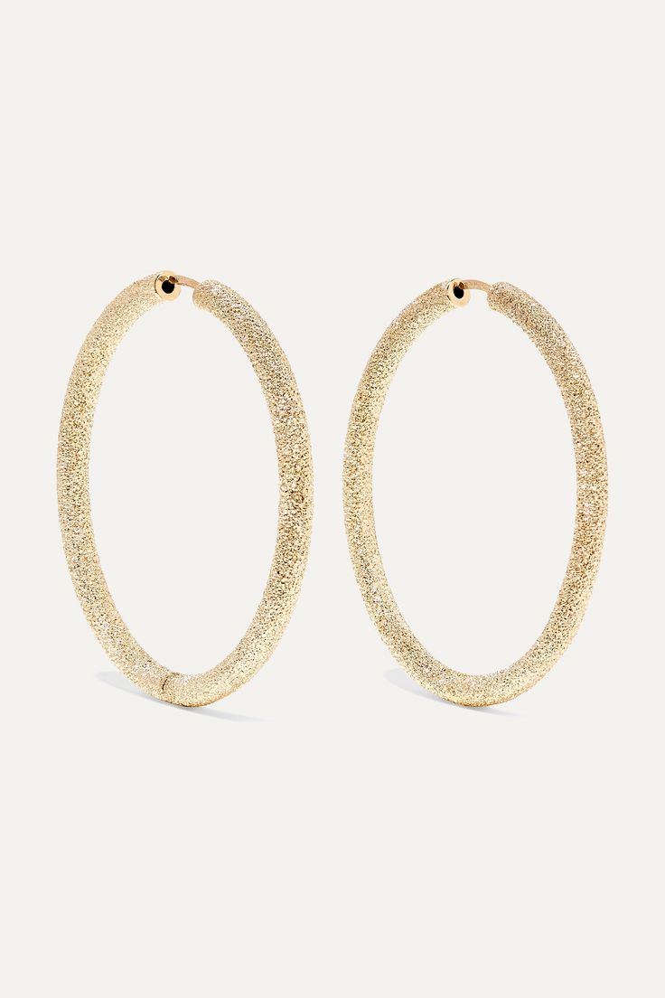 Carolina Bucci grew up surrounded by jewelers and would often design pieces as a teenager, gifting them to her father on his birthday. Handmade by expert craftsman in the label's Italian workshop, these hoop earrings are cast from 18-karat gold and hammered with a diamond-tipped tool to create the shimmering 'Florentine' finish. Let them really shine by keeping hair tucked behind your ear.  Shown here with: [Lisa Marie Fernandez Dress id1048262], [Carolina Bucci Necklace id943387]. Luxury 14k Gold Hoop Earrings With Diamond Cut, Luxury 14k Gold Diamond Cut Hoop Earrings, Luxury Diamond Cut 14k Gold Hoop Earrings, Luxury 14k Gold Hoop Earrings For Wedding, Luxury Pierced Hoop Earrings For Gift, Luxury Yellow Gold Diamond Cut Hoop Earrings, Elegant Hallmarked Small Hoop Jewelry, Luxury White Gold Hoop Earrings As Gift, Luxury 14k Gold Hoop Earrings For Formal Occasions