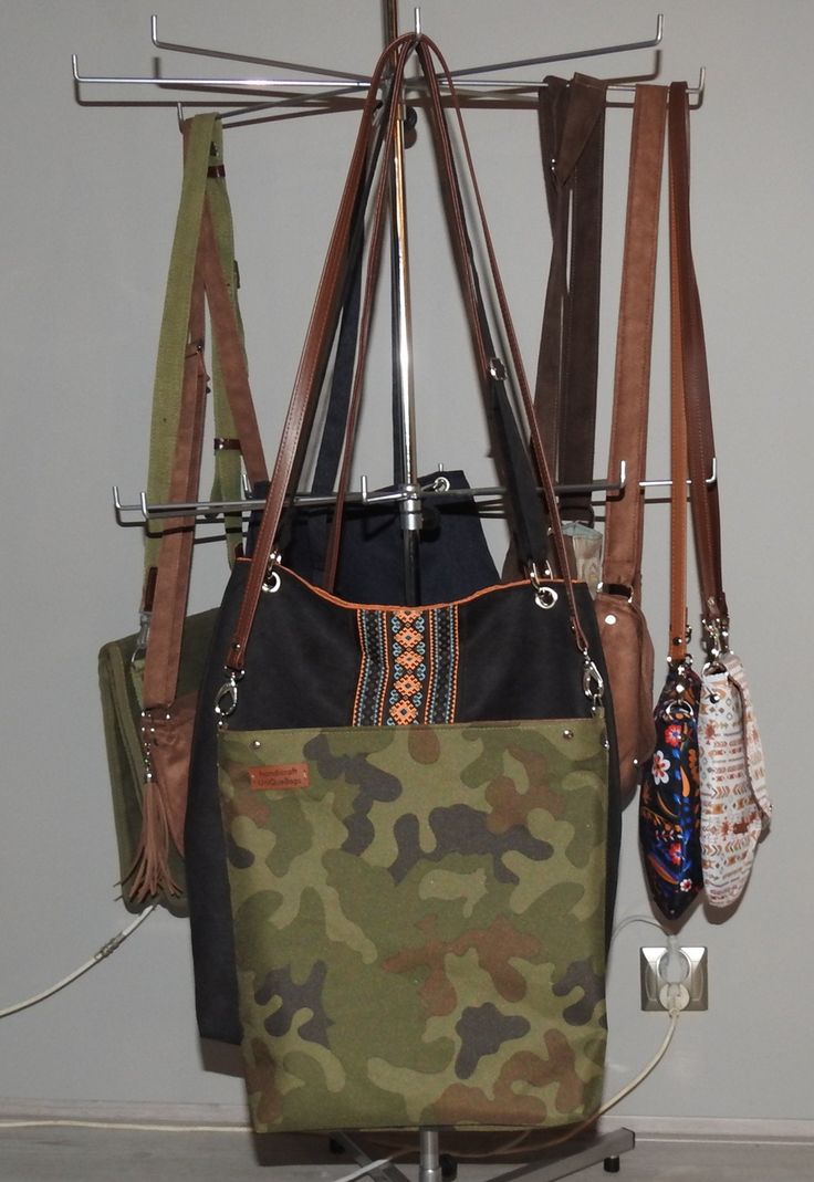 "UniQueBags handbags store offers: Military style crossbody bag, made of waterproof and durable strong tactical fabric. The interior is made of alcantara suedette, there are two slip pockets. The whole closes by strong metalzip. The strap of the bag is attached with carabiners, it is made of the highest quality Italian eco leather-this gives the bag a slightly more elegant look. The bag keeps its shape without filling, the bottom is additionally solidly stiffened. Dimensions of the bag: 34/35/8c Khaki Shoulder Backpack With Zipper Pocket, Outdoor Satchel Bag With Detachable Strap, Outdoor Military Satchel Bag, Functional Khaki Canvas Bag With Adjustable Strap, Functional Crossbody Canvas Bag With Removable Pouch, Military Style Satchel Bag For Outdoor, Military Style Outdoor Satchel Bag, Khaki Crossbody Bag With Zipper Pocket, Military Style Satchel For Outdoor