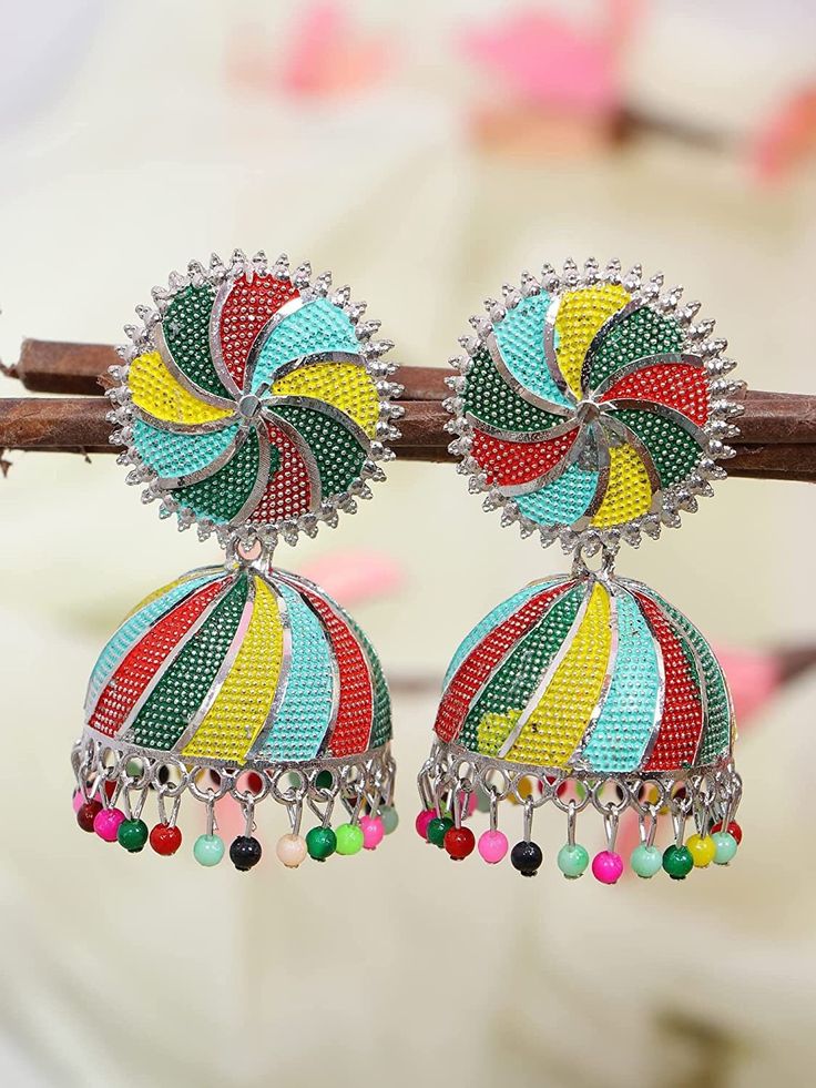 Overview These stylish Jhumki Earrings set from JewelryTrack will certainly leave you spellbound. These Jhumki Earrings set have an excellent finish and gives out an exquisite sense of style. If you are looking for an amazing Fashion Jewelry set for special occasions such as Anniversary, Engagement, Party, Wedding or for gifting , then your search ends here.  Item Description: The look is stunning and preciously suitable for all kinds of dressy occasions. Metal: alloy OCCASION: PARTY WEAR , WEDD Luxury Meenakari Jhumkas For Festive Occasions, Cheap Meenakari Danglers For Festivals, Multicolor Bollywood Round Earrings, Bollywood Style Multicolor Round Earrings, Bollywood Multicolor Round Earrings, Multicolor Temple Jewelry Jhumkas For Festivals, Multicolor Round Danglers For Celebration, Multicolor Festive Earrings, Multicolor Temple Jewelry Chandbalis Drop Earrings