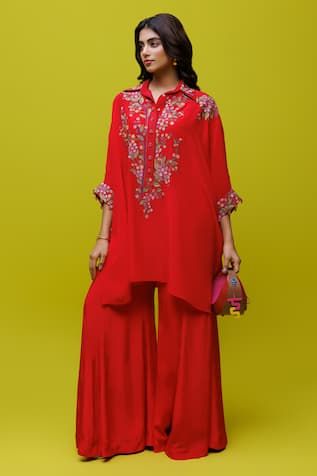 Red kaftan with multicolor thread embroidery in floral pattern. Paired with flared pant. - Aza Fashions Red Floral Embroidered Palazzo Set For Navratri, Red Chikankari Embroidery Kaftan For Eid, Red Chikankari Embroidered Kaftan For Eid, Red Chikankari Embroidery Kaftan For Festive, Red Palazzo Set With Mirror Work And Long Sleeves, Red Chikankari Embroidery Kaftan For Festive Occasions, Red Palazzo Set With Mirror Work, Red Long Sleeve Palazzo Set With Floral Embroidery, Embroidered Long Sleeve Red Palazzo Set