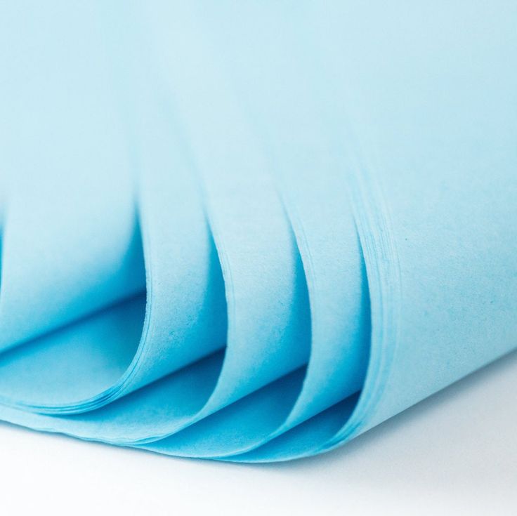 blue sheets folded on top of each other