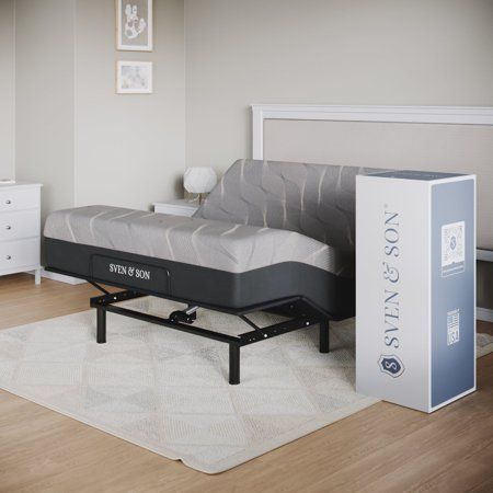 a bed with a box spring attached to it and a mattress on the floor next to it