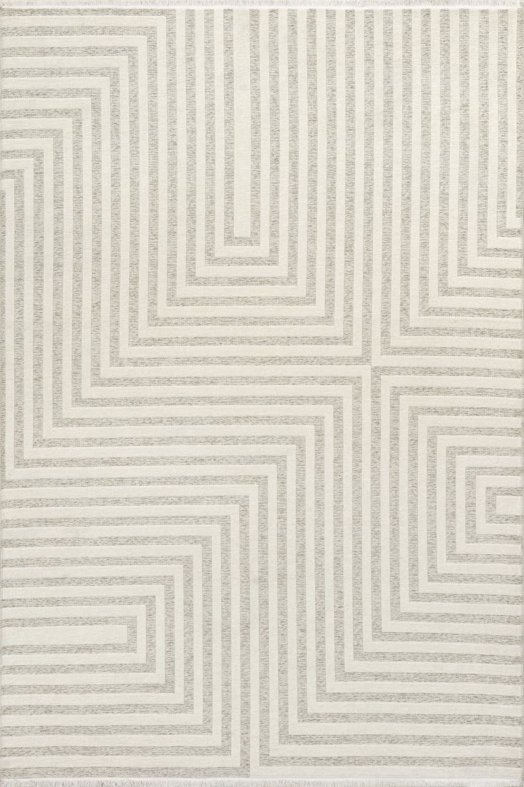 a white rug with lines on it