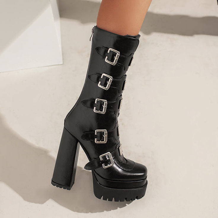 Looking for a unique and stylish way to add some edge to your wardrobe? Check out our gothic platform boots! These beautiful black boots are perfect for dressing up or down. and they really make a statement. They feature buckles for a dramatic look. and they're calf-height for added style. Plus. they have a chunky platform heel that provides both comfort and style.Whether you're hitting the town or just hanging out at home. our gothic platform boots are sure to add some fun and flair to your loo Edgy Fall Platform Boots For Concert, Fall Platform Boots For Alternative Fashion, Gothic High Ankle Mid-calf Boots For Fall, Punk High Heel Platform Boots With Buckle Closure, Gothic Platform Heeled Boots For Fall, Fall Alternative High Heel Platform Boots, Black High Cut Platform Boots For Fall, Black High-cut Platform Boots For Fall, Fall Concert High Heel Platform Boots