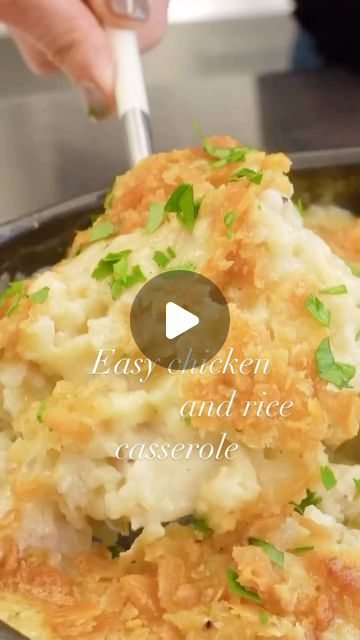 a person is cooking mashed potatoes in a skillet with parsley on top